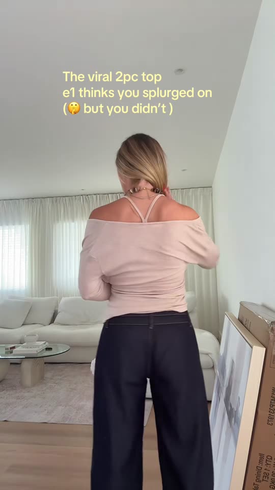 The wrap in the tank can be worn separately or together, and the tank comes with